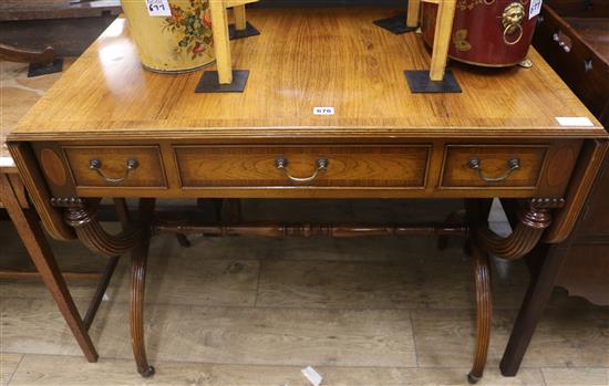 A Regency style banded mahogany sofa table, W.95cm